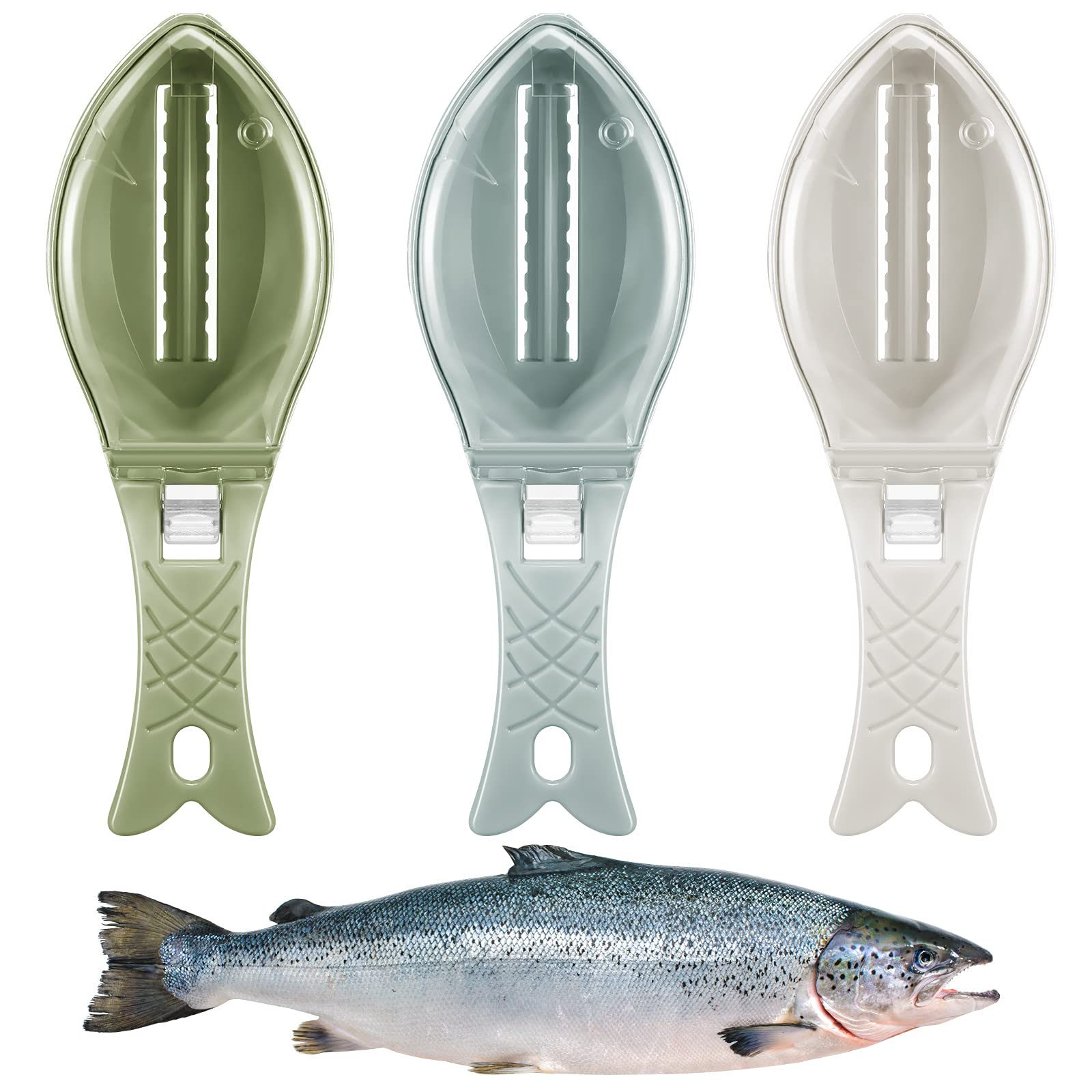 Three fish-shaped scale removers are displayed in white, green, and blue colors, lying flat and showcasing their design.