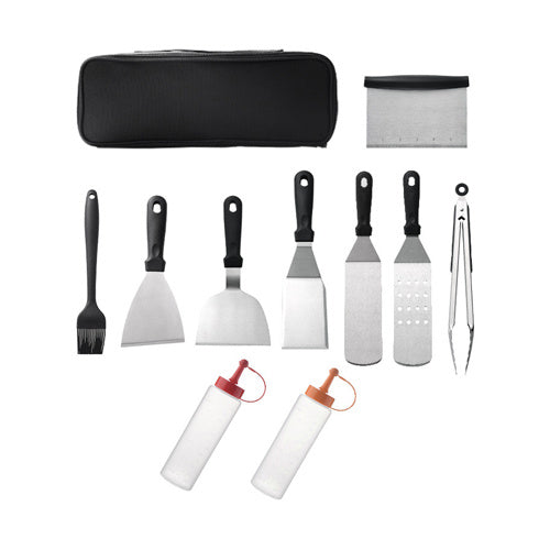 Outdoor BBQ Setup: This image displays an outdoor BBQ setup with the complete BBQ tool set, perfect for enjoying a delightful grilling experience with family and friends.