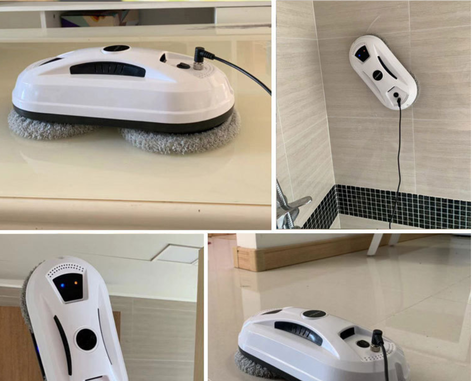  the window cleaning robot being used on a tiled wall, demonstrating its versatility and ability to clean surfaces other than glass.