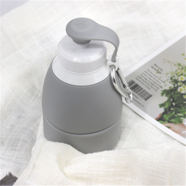 The image features a gray silicone water bottle head