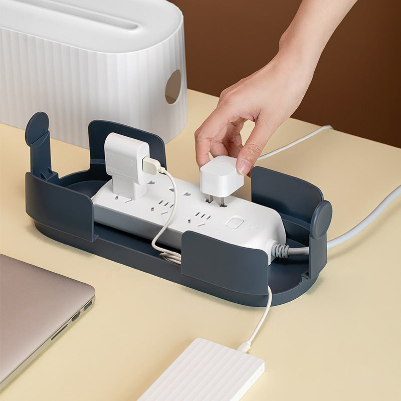 A user-friendly scenario is depicted, where hands are shown accessing the power strip inside the Cloud Power Storage Box, showcasing the ease of use for cable holders and charger cord organization.