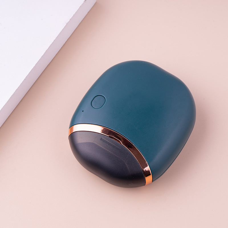Displayed in a sophisticated navy tone, the Nail Trimmer's smooth, ergonomic body is complemented by a luxurious gold-toned band, hinting at the seamless blend of function and fashion.