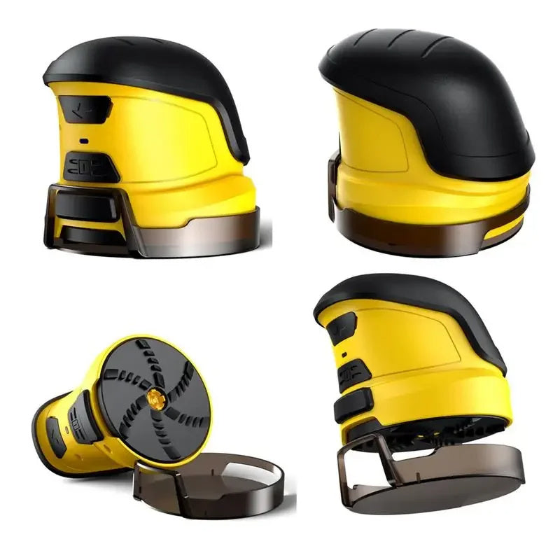 The electric snow scraper, now viewed from the top, highlights its compact, dome-like design in yellow and black, with the rotating disc visible underneath.