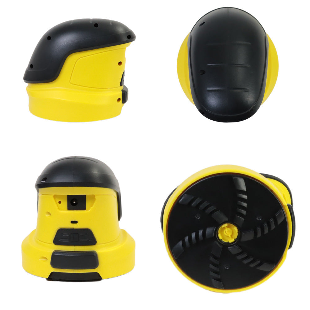 The electric snow scraper, now viewed from the top, highlights its compact, dome-like design in yellow and black, with the rotating disc visible underneath.