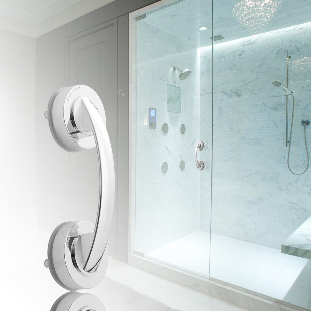 Strong Suction Cup Grab Bar Handle in a Shower: The Strong Suction Cup Grab Bar Handle is securely attached to a glass shower wall, demonstrating its sturdy hold and sleek design. The high-quality materials ensure durability and safety in wet environments. Perfect for enhancing bathroom safety.