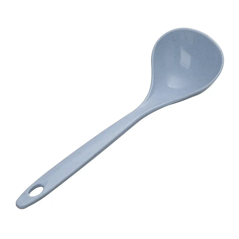A side view of the same pastel blue soup spoon ladle, showing the rounded bowl with strainer holes on one side and a long, slender handle,