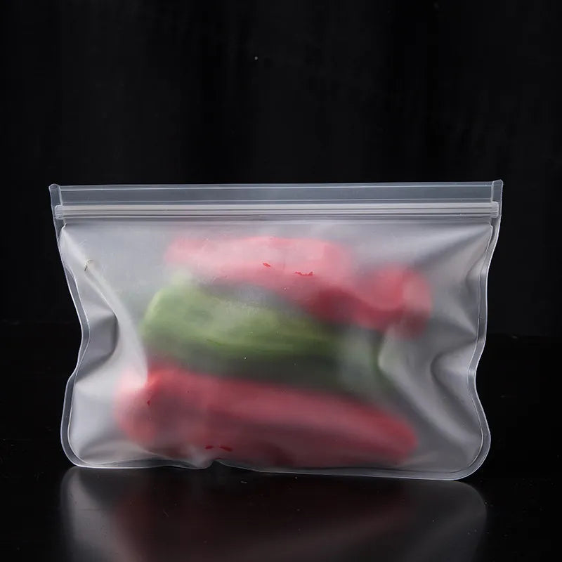 A close-up of a silicone storage bag sealed with a sliding bar, showcasing its ability to hold various fruits.