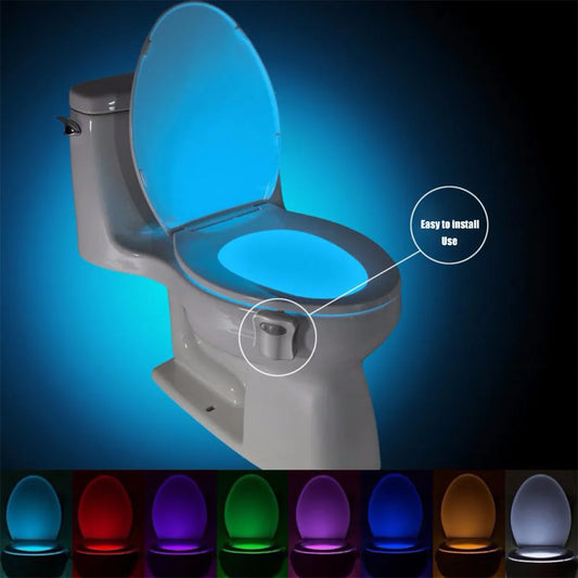 The image shows a modern toilet with a motion sensor LED light attached, illuminating the toilet bowl in a soft blue hue. Annotations indicate the light is easy to install and use. Below the main image, a series of smaller images display the LED light cycling through various colors, including red, purple, green, and orange, to a total of eight shades, demonstrating the product's color range.
