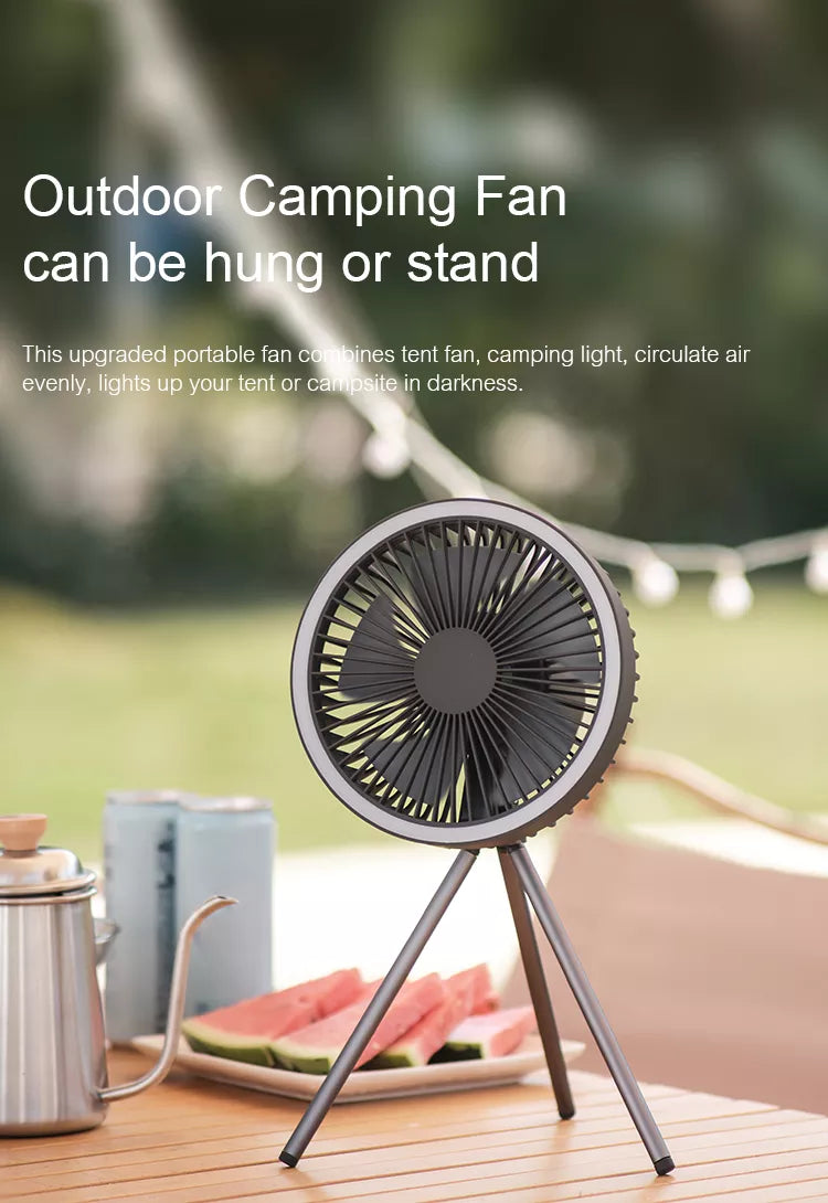 Outdoor Use Example: The fan set up outdoors with the LED light on, illustrating its practicality for camping and other outdoor activities.