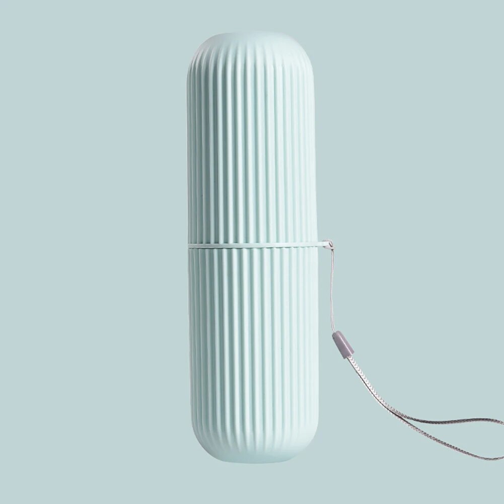 A single mint toothbrush cup with its cap secured, set against a white backdrop.