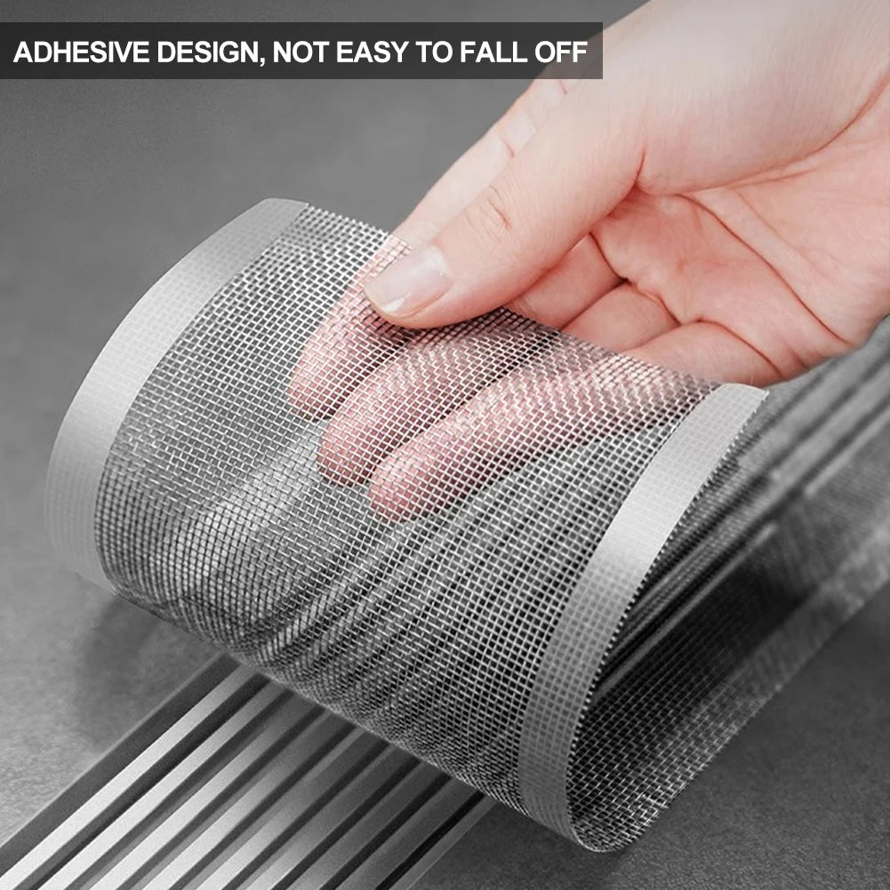 Image 5: The Disposable Shower Drain Hair Catcher being applied to a sink drain, highlighting its strong adhesive backing. The image shows the mesh filter fitting securely over the drain, preventing hair and other particles from causing clogs.