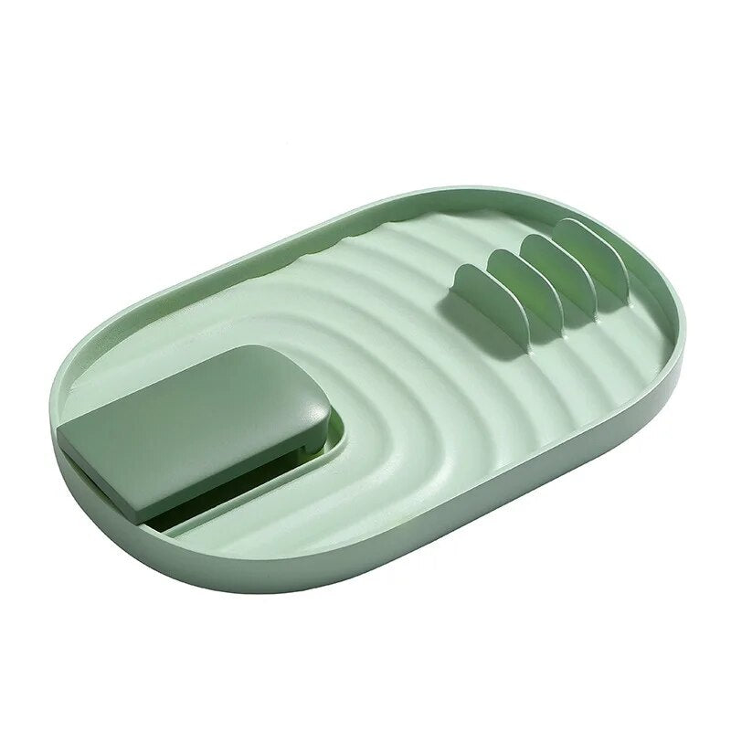 A mint green silicone rack is shown empty, focusing on its texture and shape.