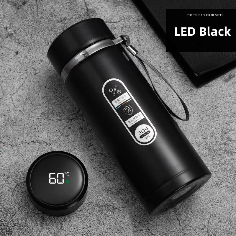 800ML-1 Liter Stainless Steel Thermos Bottle with LED Temperature Display: This image presents the bottle in black color with the LED display visible. The ergonomic handle design is highlighted, making it perfect for travel and everyday use.
