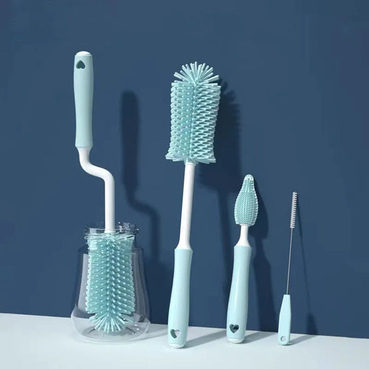 This image features a set of three silicone bottle brushes against a dark blue background. The largest brush has a long handle and dense bristles, suitable for cleaning deep bottles. A medium-sized brush with a curved handle targets corners and a small, thin brush cleans narrow straws or spouts.