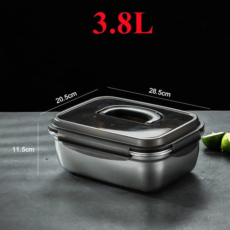 Large Capacity Stainless Steel Outdoor Portable Lunch Bento Box - 3.8L: A 3.8L stainless steel lunch bento box on a table, with its lid closed, demonstrating its leakproof design, making it perfect for snacks and lunches.