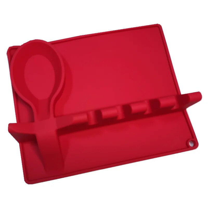 This image shows a bright red silicone spoon rest and utensil holder, featuring multiple slots for kitchen tools and a circular area for a spoon.