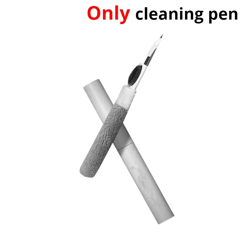 Image focusing solely on the cleaning pen, which is composed of two parts and is displayed crossed over each other