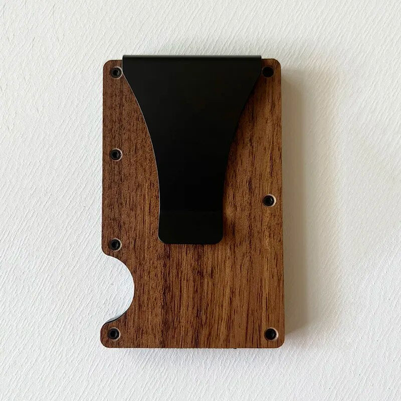 A side and front view of a slim, wood card holder with elastic cash strap, showcasing a thin profile and a compartment holding US currency notes.