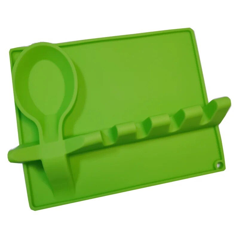 This image shows a bright green silicone spoon rest and utensil holder, featuring multiple slots for kitchen tools and a circular area for a spoon.