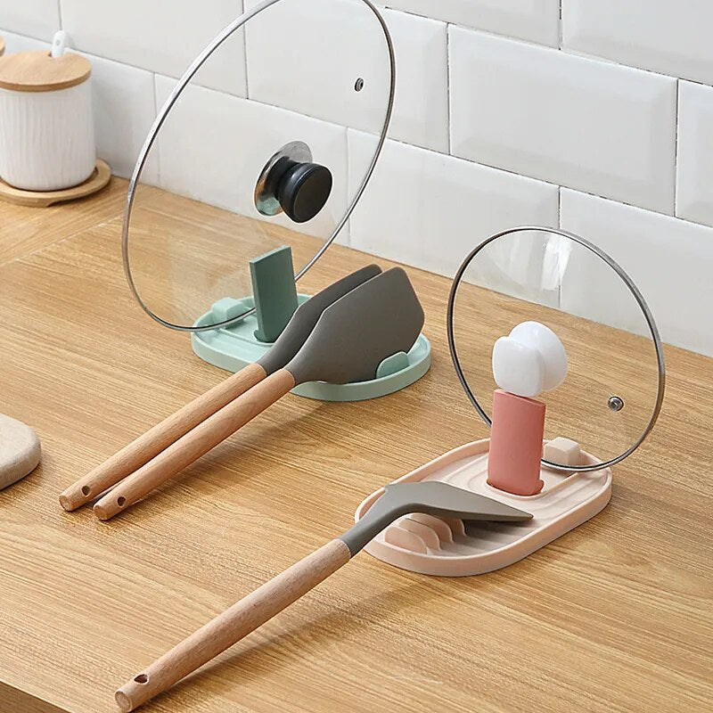 The silicone racks are displayed holding different kitchen utensils, demonstrating versatility in use.