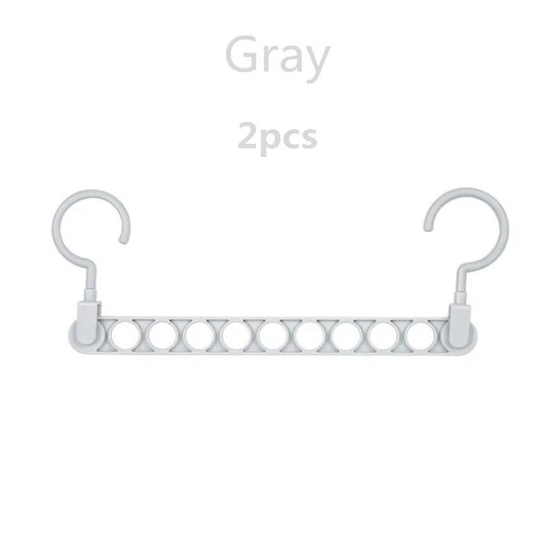 multi-port hanger in gray, white, and pink showcases the color variety and the nine-hole branch design for multiple garments.