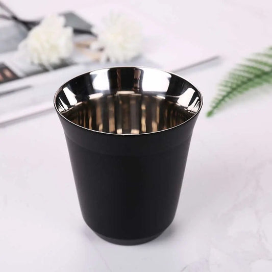 The image features a sleek, stainless steel 304 espresso cup with a capacity of 160ML. The cup has a sophisticated matte black exterior and a polished interior, reflecting its high-quality, double-layered construction that's both stylish and functional for everyday coffee enjoyment. 