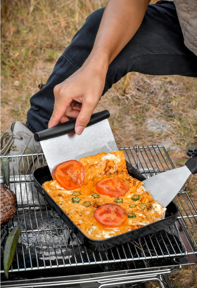 BBQ Tool Set in Use: This image captures the BBQ tool set being used to grill delicious food. The tools are designed to handle high temperatures and resist rust.