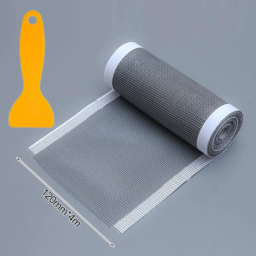 Image 8: The Disposable Shower Drain Hair Catcher unrolled next to the included plastic scraper. The gray mesh and the scraper are prominently displayed, showing the product's simplicity and practicality in maintaining clean and clog-free drains.