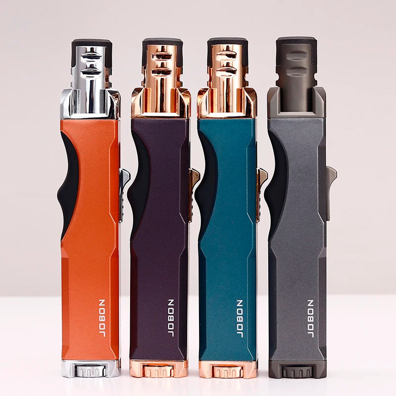  A lineup of the windproof turbine torch lighters in various colors: black, blue, orange, and gray. These butane torches are both functional and stylish.
