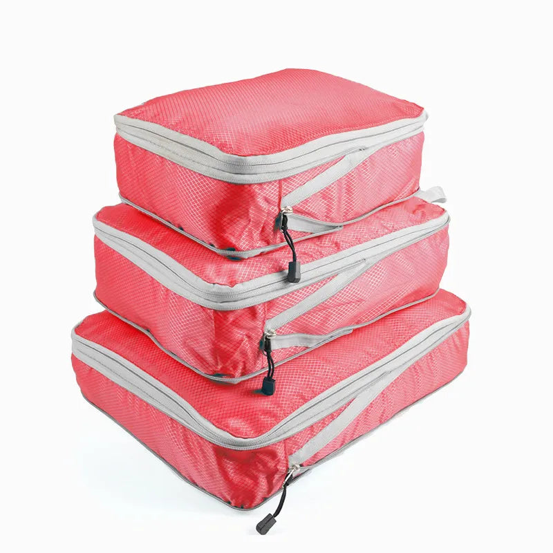 A set of  packing cubes, highlighting the same product in a vibrant color option
