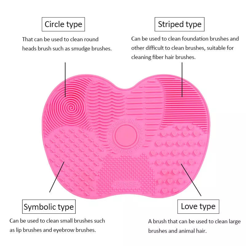 A close-up of a pink Silicone Makeup Brush Cleaner Pad with suction cups on the back, emphasizing its design features that allow it to stick to surfaces for stable and hands-free cleaning.