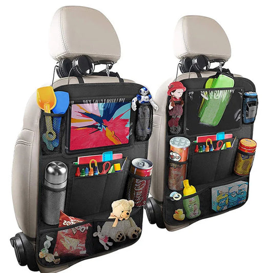 The Car Seat Back Organizer is shown attached to the back of two front seats. It is fully equipped with various items like toys, a tablet, drinks, and snacks. The organizer efficiently utilizes space with multiple storage pockets and a clear touch screen tablet holder.