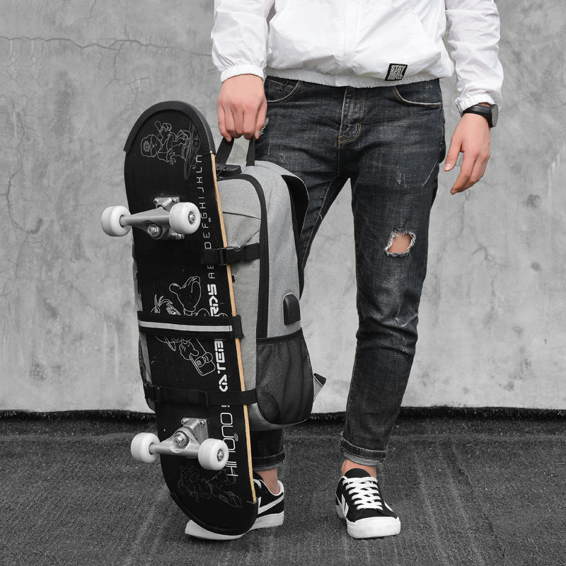 Person Holding Skateboard with Backpack: An individual is holding a skateboard, with the Anti-Theft Combination Lock USB Charging Shoulder Bag worn around one shoulder, demonstrating portability.