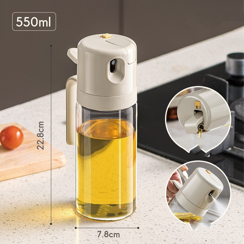 A close-up of the versatile Oil Sprayer Bottle reveals its dimensions with a filled golden oil level, highlighting the 550ml capacity and sturdy glass design, ready for any cooking or baking adventure.