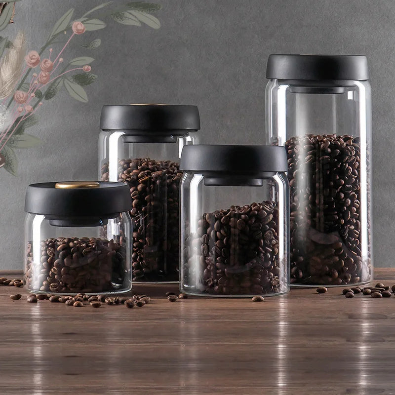 Airtight Coffee Storage Canister: A pair of hands open the Airtight Coffee Storage Canister filled with coffee beans, emphasizing the container’s easy-to-use vacuum seal and modern design.